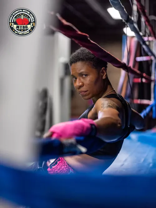 Boxer resting on the ropes, emblem locked top-left